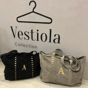 Bolso tachuelas piel 36,50€